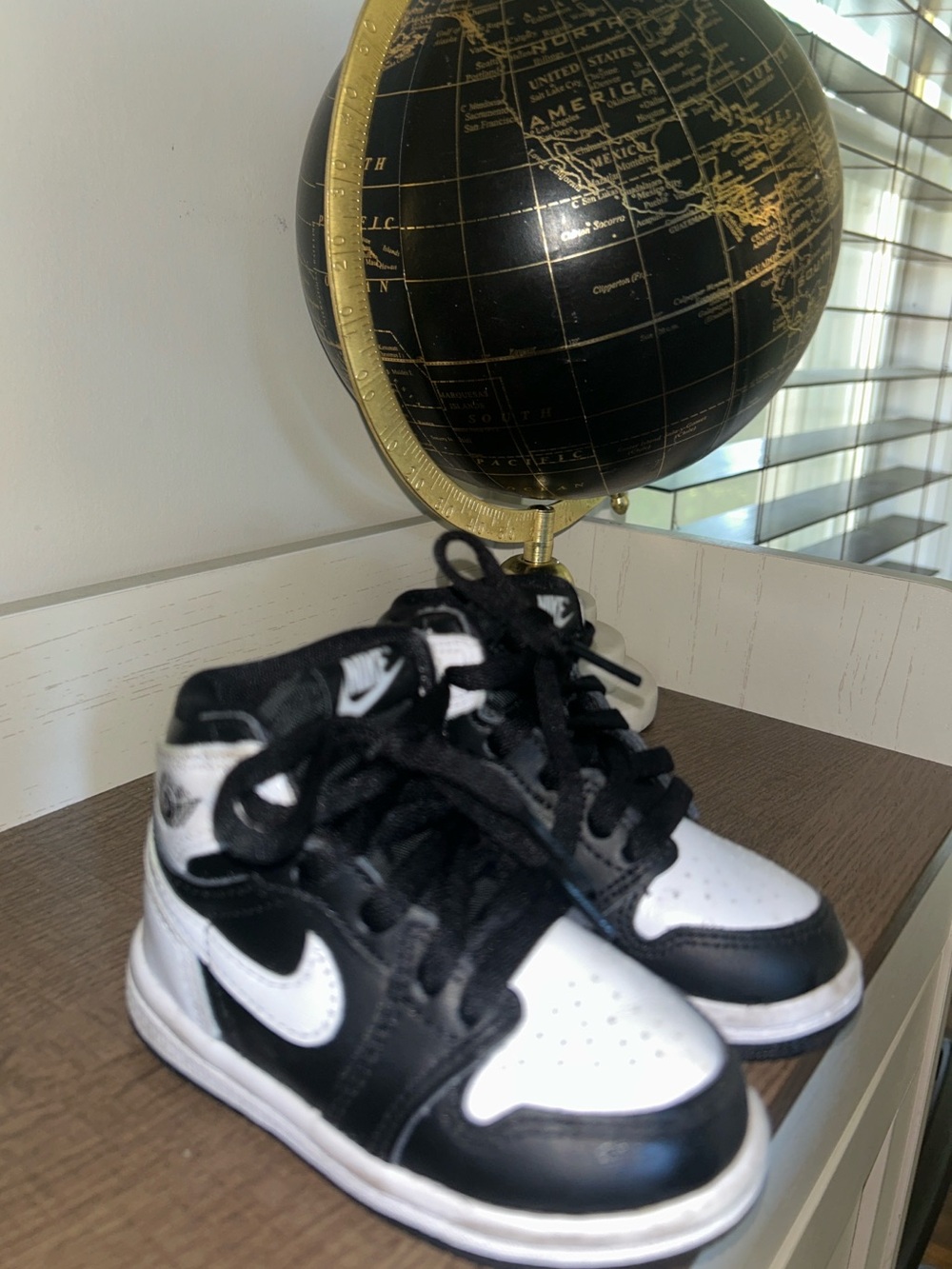 Jordan Kids Black and White High-Top Sneakers